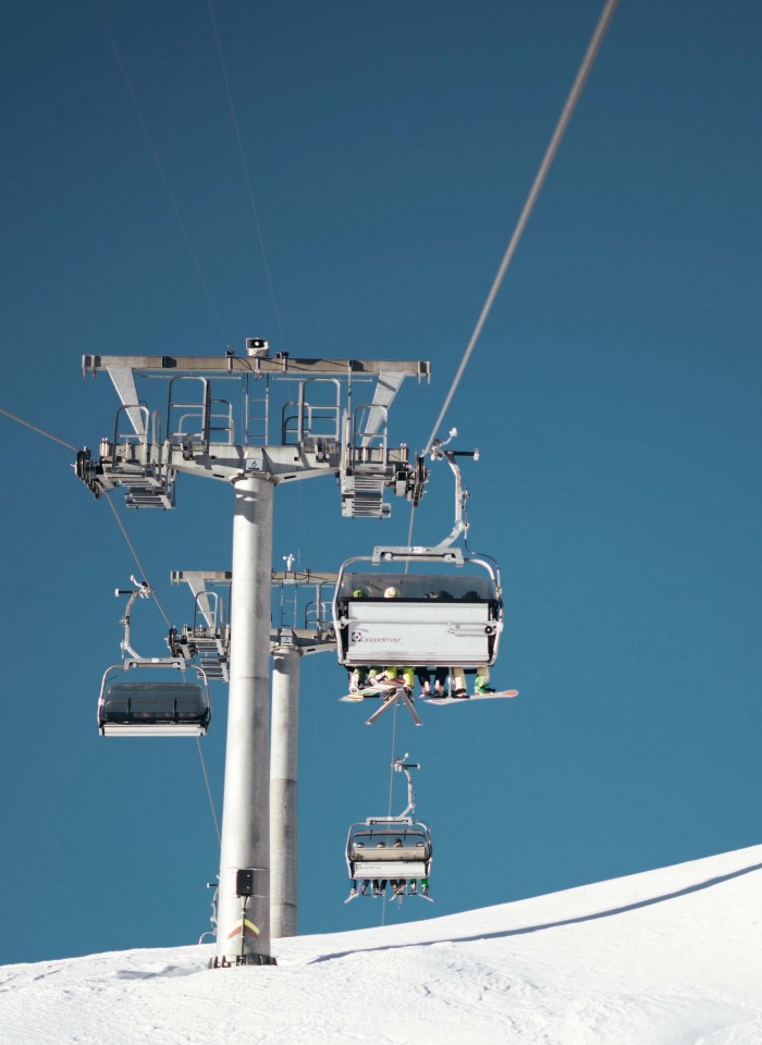 The ski lift with blue sky in the background 